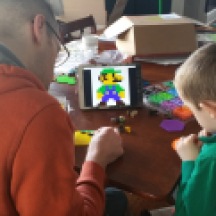 Big Lou and Little Lou make a pixel Luigi, while Gene and I make a Pikachu.
